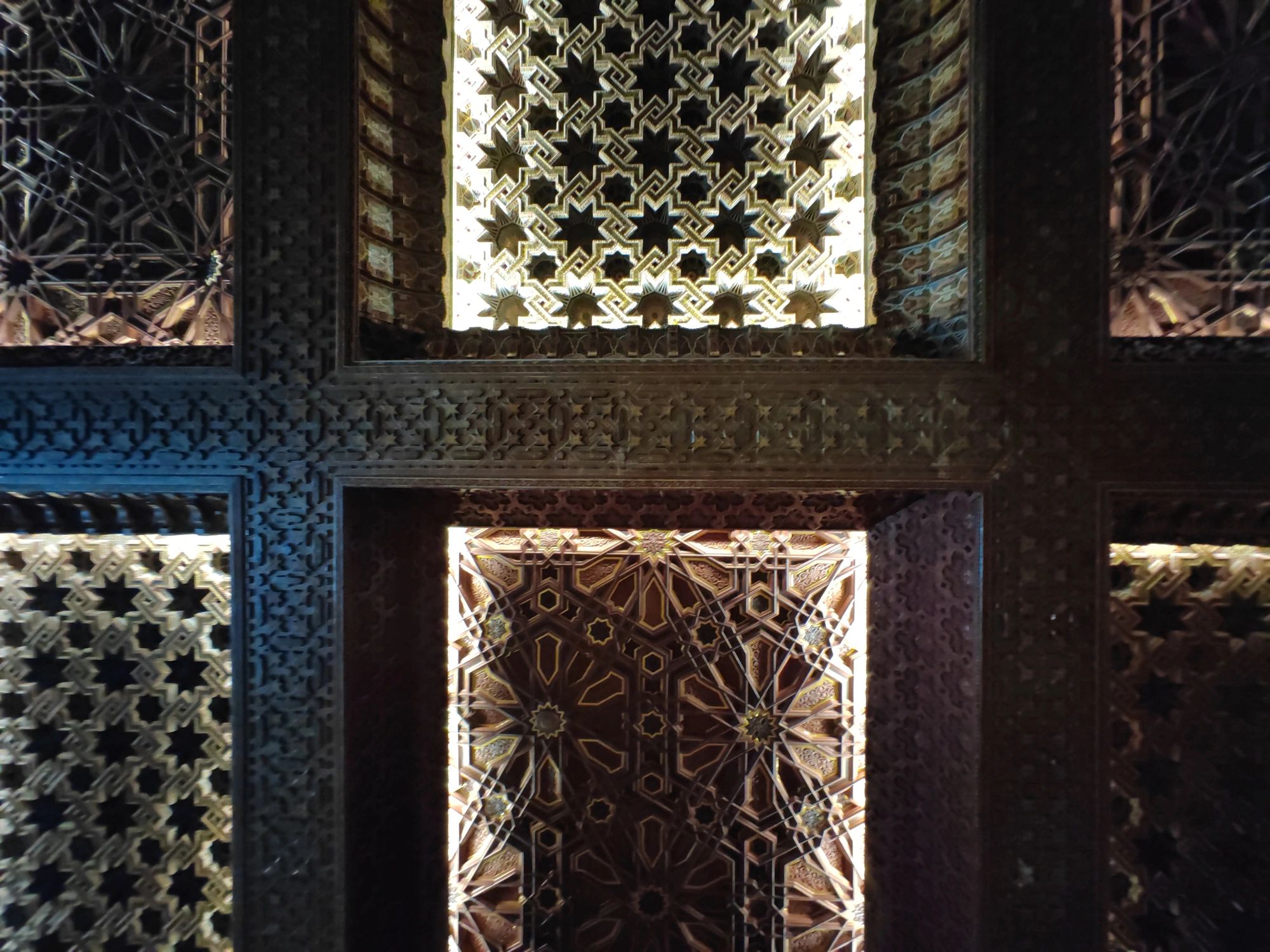 Geometric ceiling detailing in a grand interior