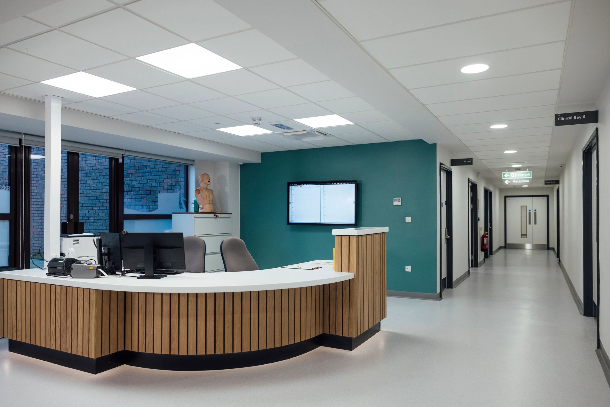 Reception suite with custom service desk