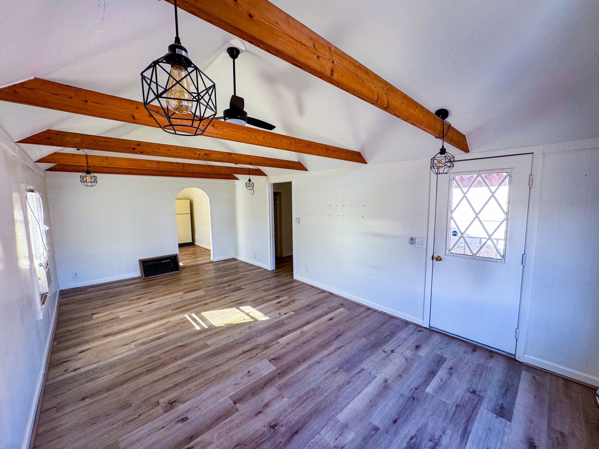 Residential living room with wood ceiling beams
