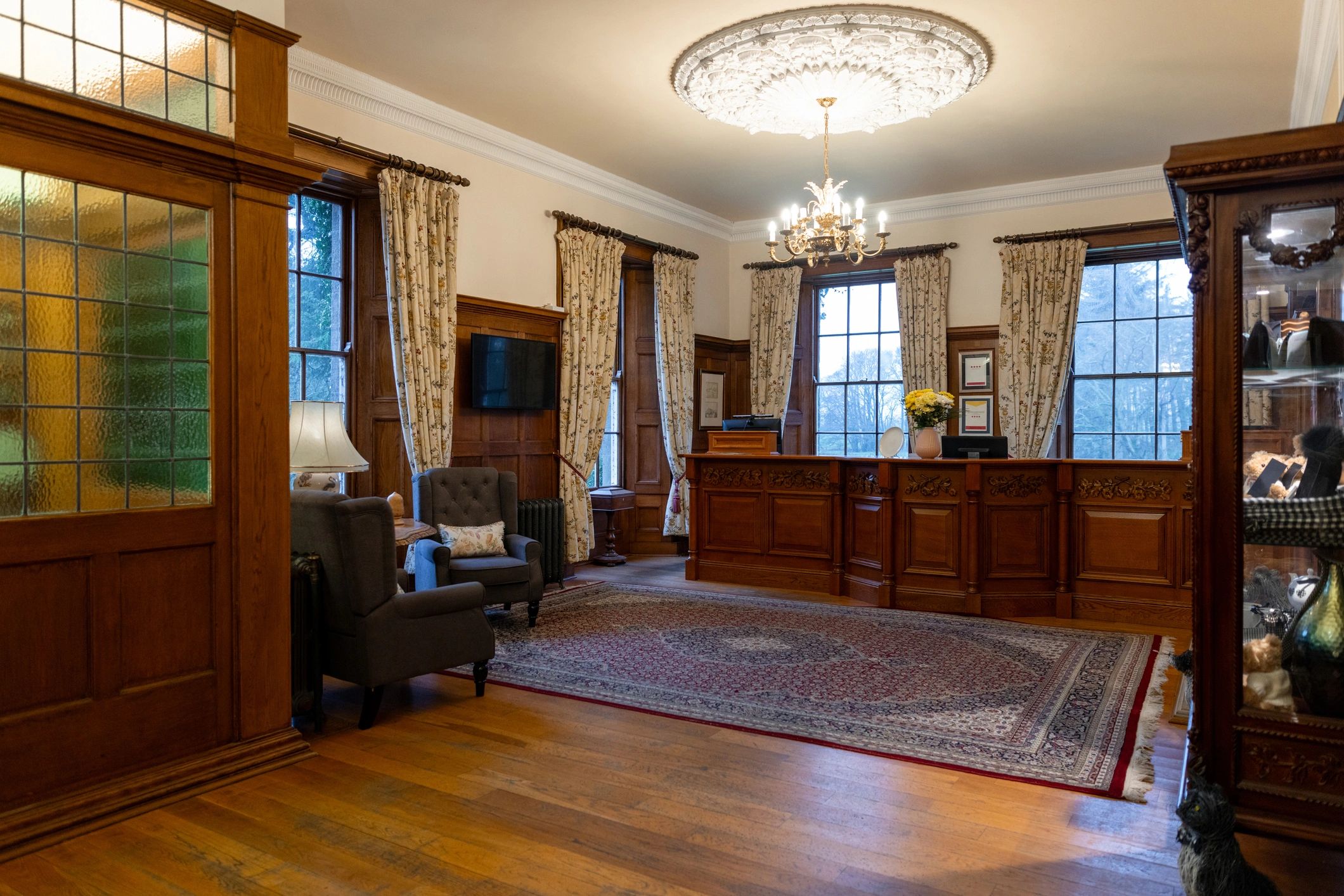 Hospitality reception with custom wood millwork